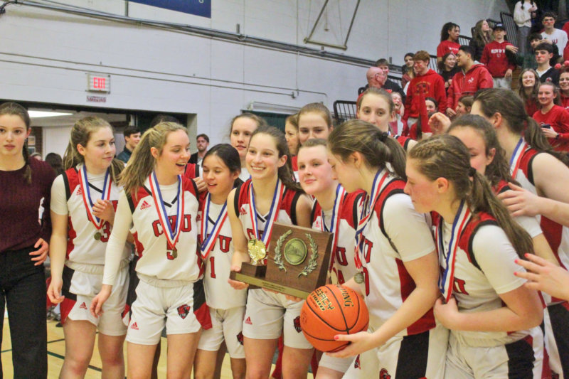 Photo by Scooter MacMillan Winning the state title was a new experience for this team. The last Redhawk’s girls basketball championship came before they entered high school.