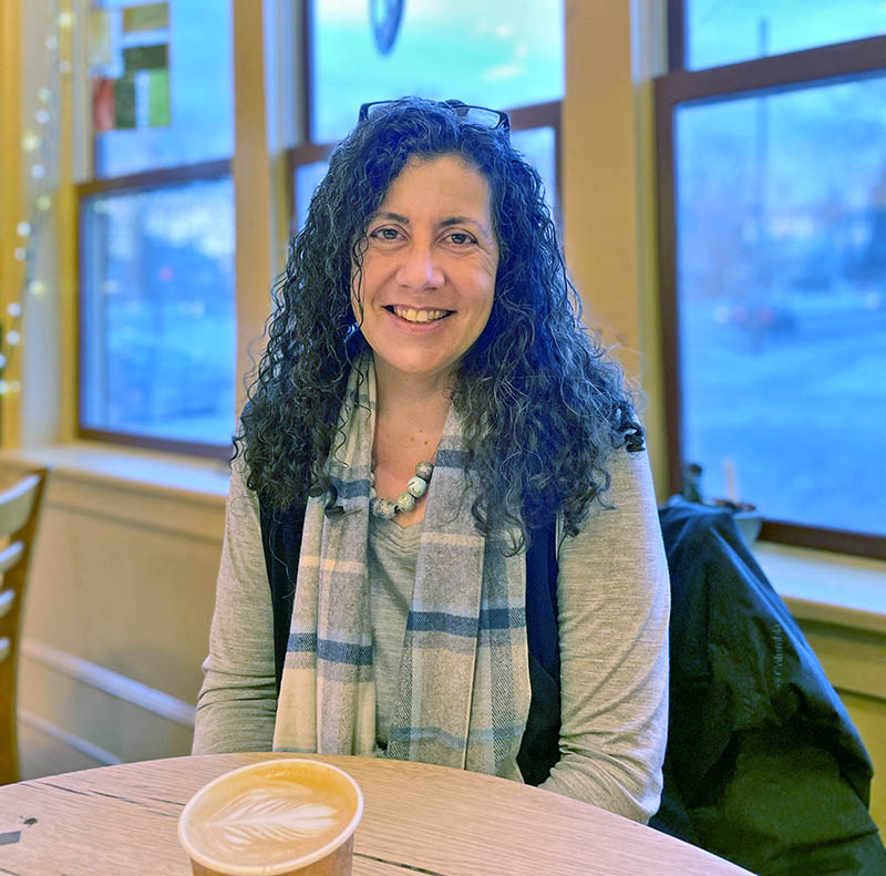Photo by Cassie YorkLori York, pictured here at Village Wine and Coffee in Shelburne, feels as though she has found her dream job at the Charlotte Senior Center.