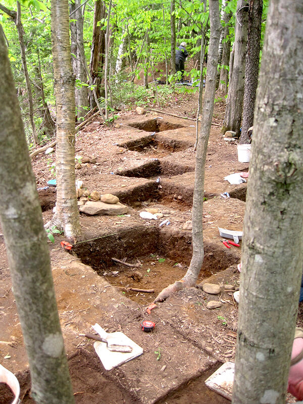 Photo from The Valley ReporterA traditional series of test pits at a dig near Warren Falls in West Haven using trowels and shovels.