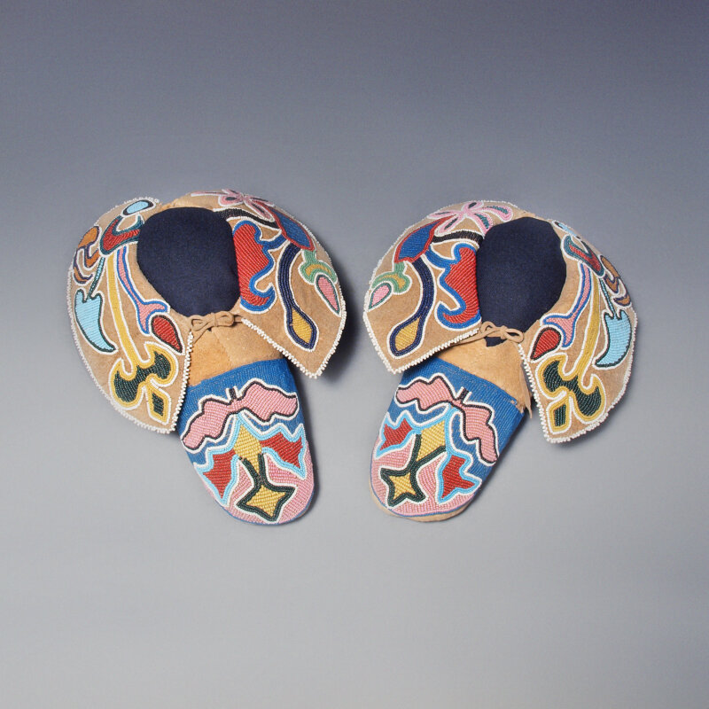 Photo by Jennifer HardmanArtist formerly known (Iowa),Moccasins, ca. 1860–70. Perry Collection of Native American Arts. M23.