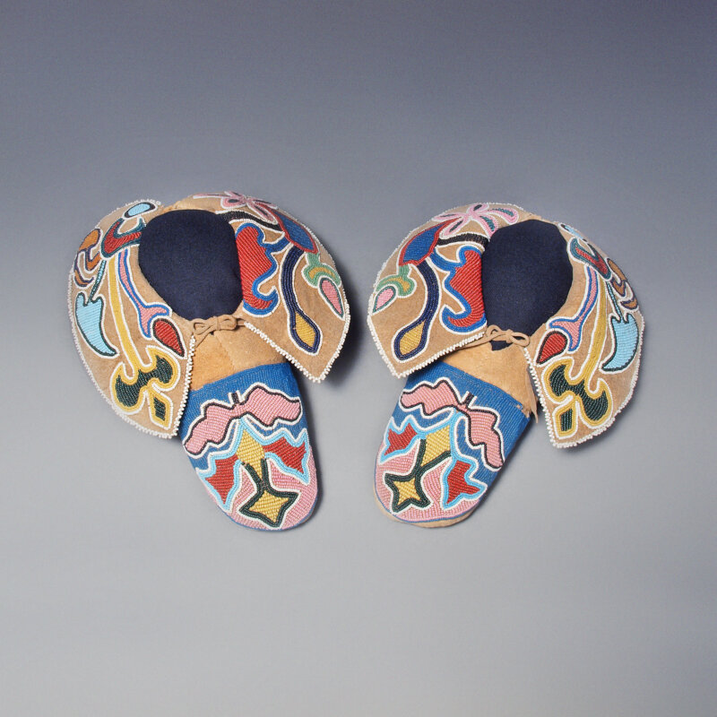 Photo by Jennifer HardmanArtist formerly known (Iowa),Moccasins, ca. 1860–70. Perry Collection of Native American Arts. M23.