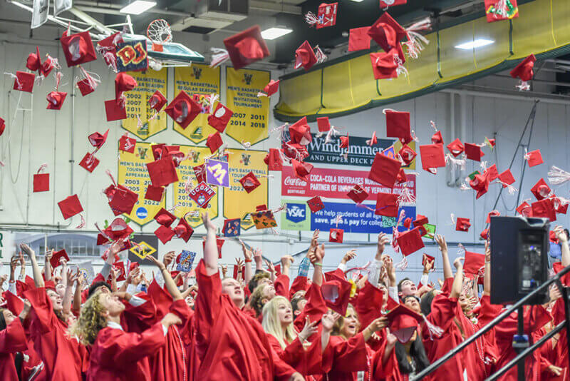 Photo by All FreyThe 2023 graduates of Champlain Valley Union celebrate turning the page on the high school chapter of their lives.