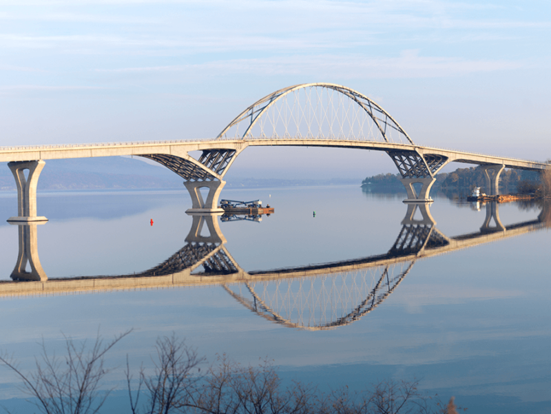 Photo by Trey Cambern Photography/Courtesy of HNTB The Lake Champlain Bridge at Crown Point is part of the scenic drive a volunteer would experience picking up newspapers at the printer in New York once a month.