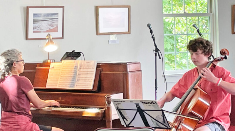 Story Holmes on cello with Julie Holmes playing piano.