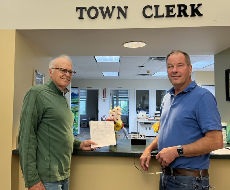 Courtesy photo
From left, Lane Morrison and Charles Russell submit a petition for a vote by residents on whether Charlotte will change from a town administrator to a town manager.