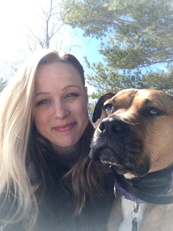 Courtesy photo. Charlotte Volunteer Fire and Rescue Battalion Chief Caitlin Herr enjoys spending her free time with her rescue dog Luna.