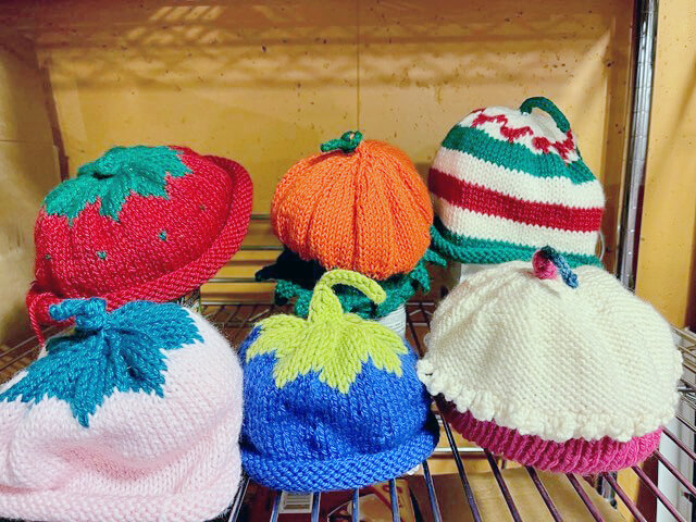 Photo by Cindy Tyler.
Above: Hats knit by Charlotte Congregational Church parishioners for the food shelf.