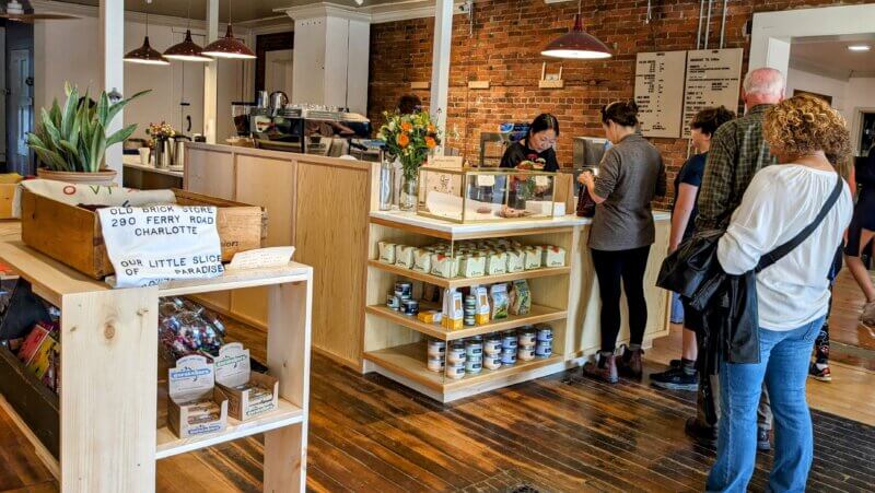 Photo by Lee Krohn.
Customers inside the Old Brick Store in Charlotte on a recent day.