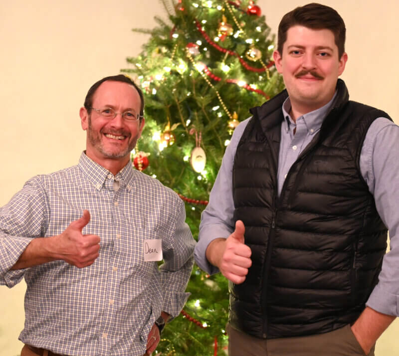 Photo by Lee Krohn.
Dean Bloch, left, celebrates his retirement as town administrator with new town administrator Nate Bareham.