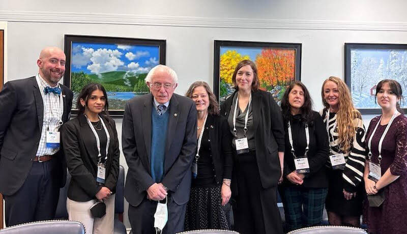 Courtesy photo. 
Sen. Bernie Sanders, center, and Champlain Valley Union High mentor coordinator Alison Duback (fourth from right) join a group of educators in Washington, D.C., at the National Mentoring Summit.