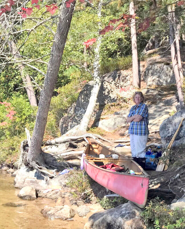 Courtesy photo Louise McCarren stands on the shore after a day of paddling and exploring on a multi-generational family camping trip in September 2019 on Upper Saranac Lake in the Adirondacks.