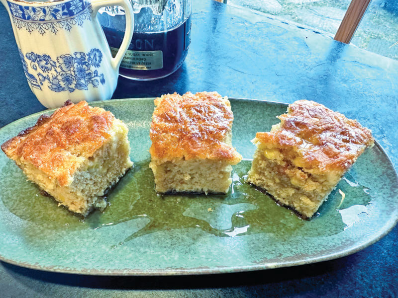 Photo by Dorothy Grover-Read. 
A slice of cornbread — drizzle with some dark amber maple syrup, and life is good.