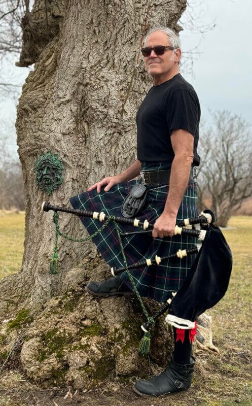 Photo by Douglas Webster. 
Douglas Webster’s musical talents include the bagpipe.