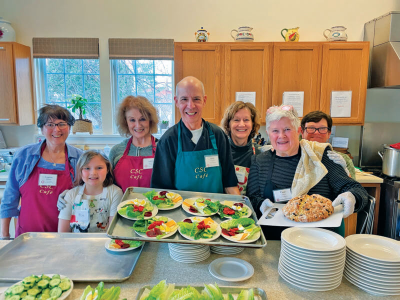 Photo by Lori York. Volunteers of all ages enjoy helping out with our weekly Monday lunch at the senior center.