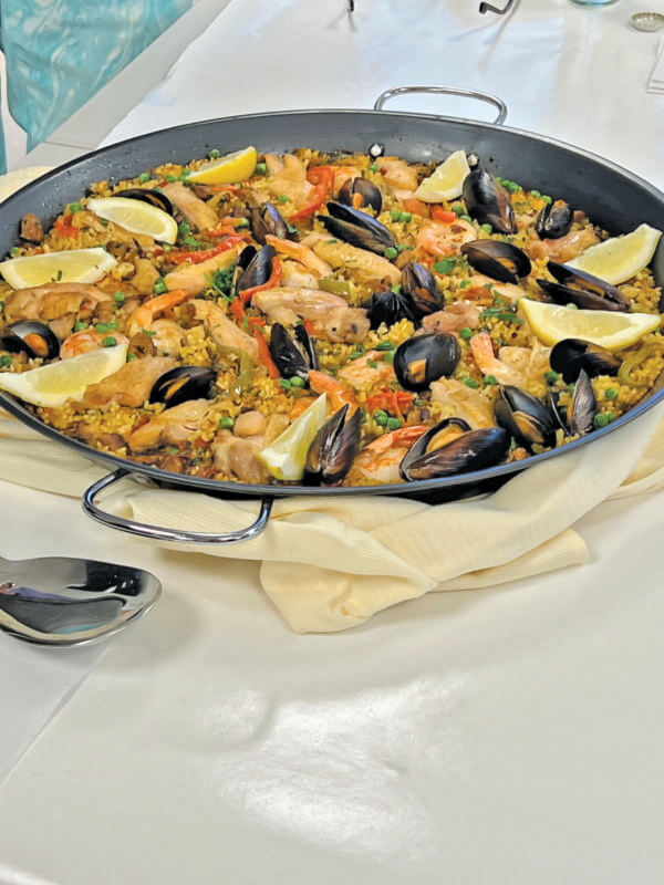 Photos by Anne Marie Andriola
From left, Spanish paella was one dish from the library’s latest cooking book club event on April 10.