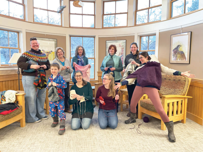 Courtesy photo. Hannah Miller, a Vermont State University professor, visited the Charlotte Library’s knitting group. Miller’s goal is to visit – and knit– in as many of Vermont’s public libraries as she can during her sabbatical.