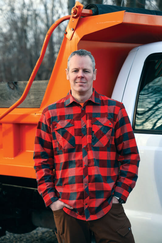 Photo by Noah Jordan. Mike Jordan enjoys helping others with their driveway issues.