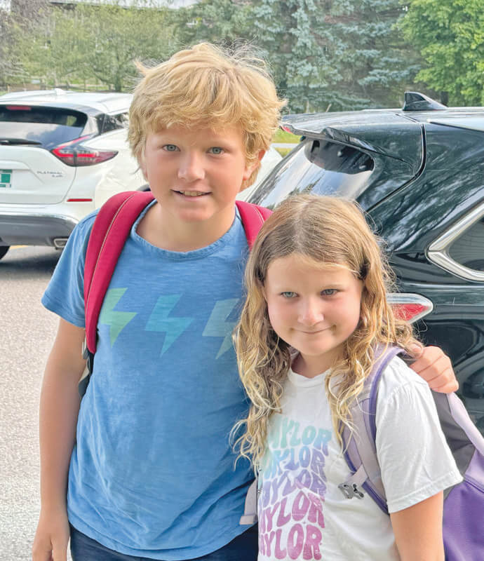 Photo by Scooter MacMillan.
On Monday, Aug. 26, Jackson and Leigh Karczewski prepare to head into Charlotte Central School and into another year of exploring the world through learning.