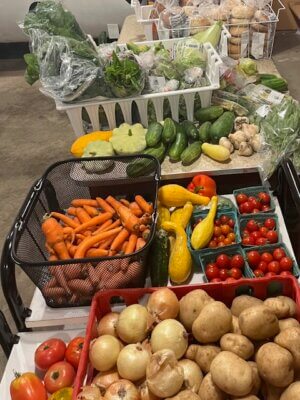 Photo by Nancy Bloch. A colorful summer harvest is spread out on a table at the Charlotte Food Shelf. If you have surplus from your harvest, please bring it to the food shelf’s 3-6 p.m., Wednesday, Sept. 25, distribution.