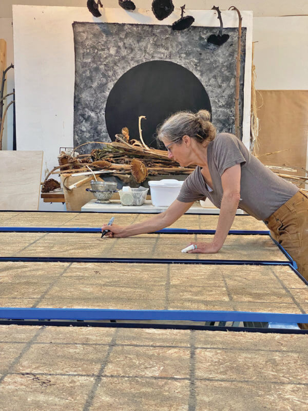Courtesy photo. Nancy Milliken at work in her studio.
