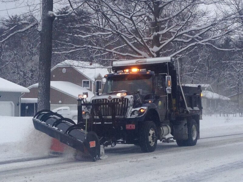 Photo courtesy town of Colchester.
A plow truck clears away snow from a road. 