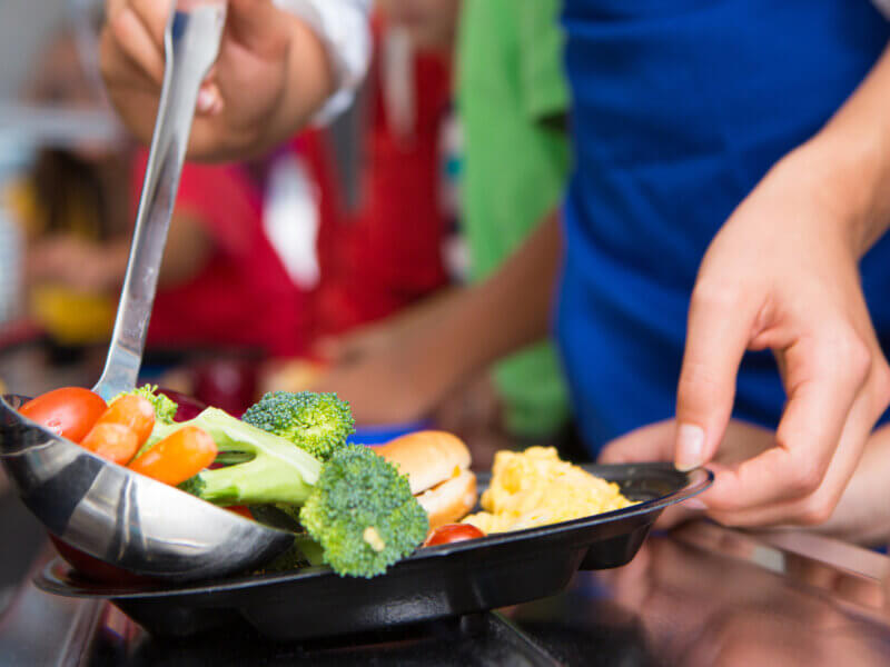 Photo by Vermont Agency of Agriculture, Food and Markets. A school lunch line.