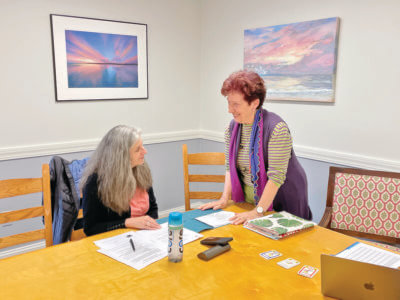 Photo by Lori York Professor Nicole Librandi offers guidance to student Mary Richards during a beginner Italian class at the senior center.