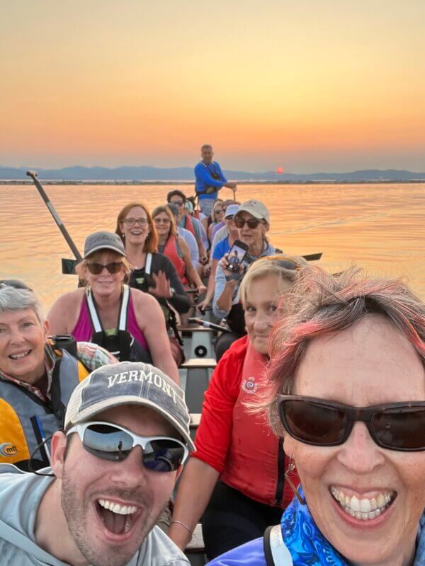 Courtesy photo. Zach Martin (left) and Shannon Cunniff celebrate with fellow crew members on Lake Champlain.