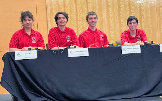 From left, Zoe Mui, Wylie Ricklefs, Charles Redmond and Jacob Graham are prepared to play another match in Atlanta at the scholars bowl national tournament.