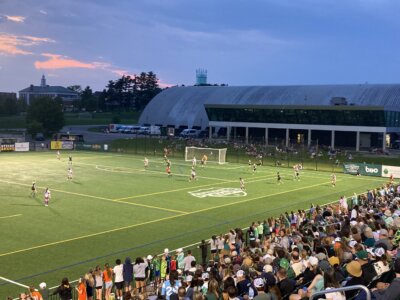 Photos by Busy Anderson. Players watch a ball in the air on June 11 during the match between the Green and Flower City in Burlington.