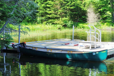 Photo by Kate Kampner. The electric canoe stationed at one of the Green River Reservoir’s docks.