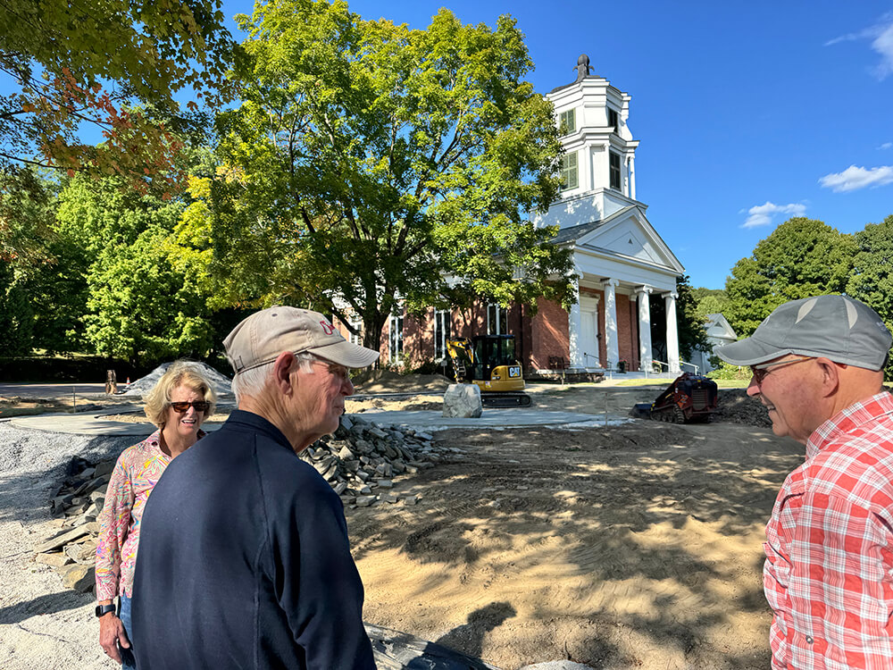 Photo by Scooter MacMillan From left, Francis Foster, Jim Hyde and Glen Findholt discuss the Charlotte Congregational Church’s new Sanctuary and Memorial Garden.