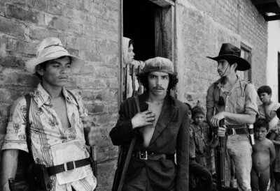 Photo by Robert Nickelsberg ERP guerrillas pause to talk to local residents.
