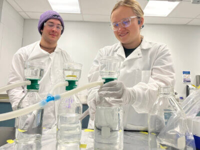 Vermont State University Castleton students Olivia Rutkowski (right) and Dominic Mazzilli study samples from the Canada trip.